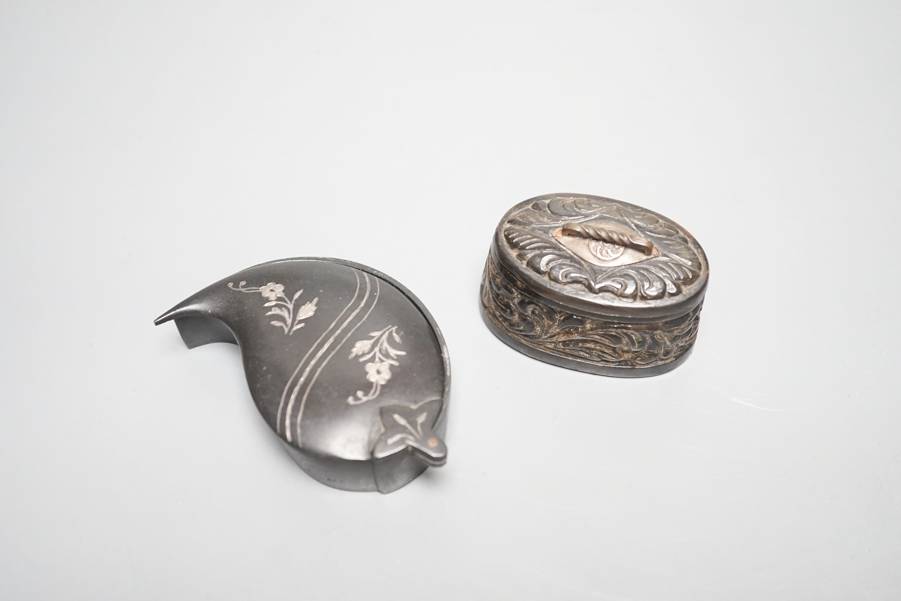 A 19th century Malay horn betel nut box and a Bidriware silver inlaid ‘boteh’ box and cover
